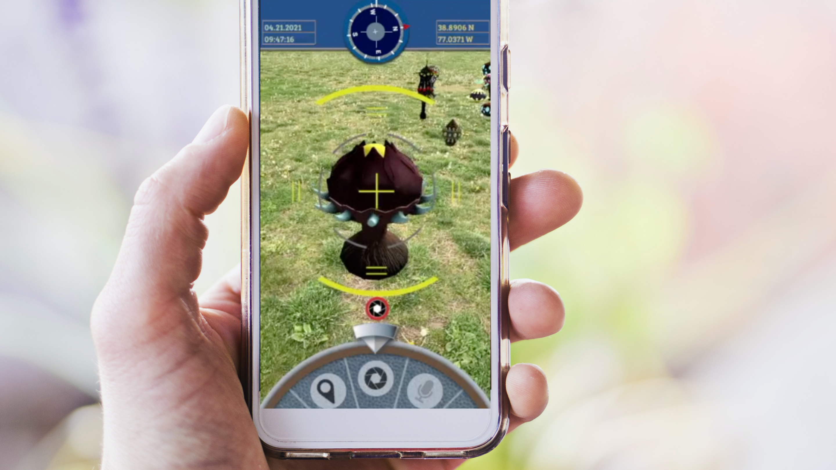 Close-up of a phone screen showing the Wildspot game. The phone is held in a hand.