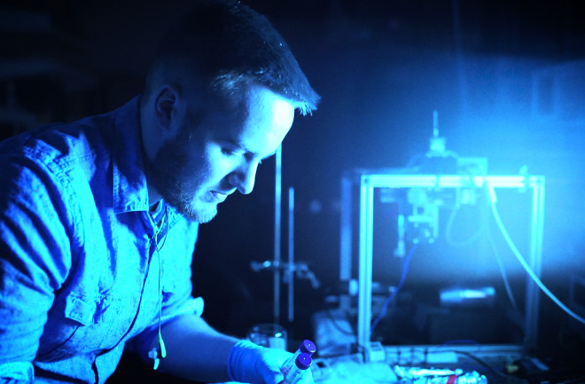 Researcher at work in lab that studies Alzheimer's disease.