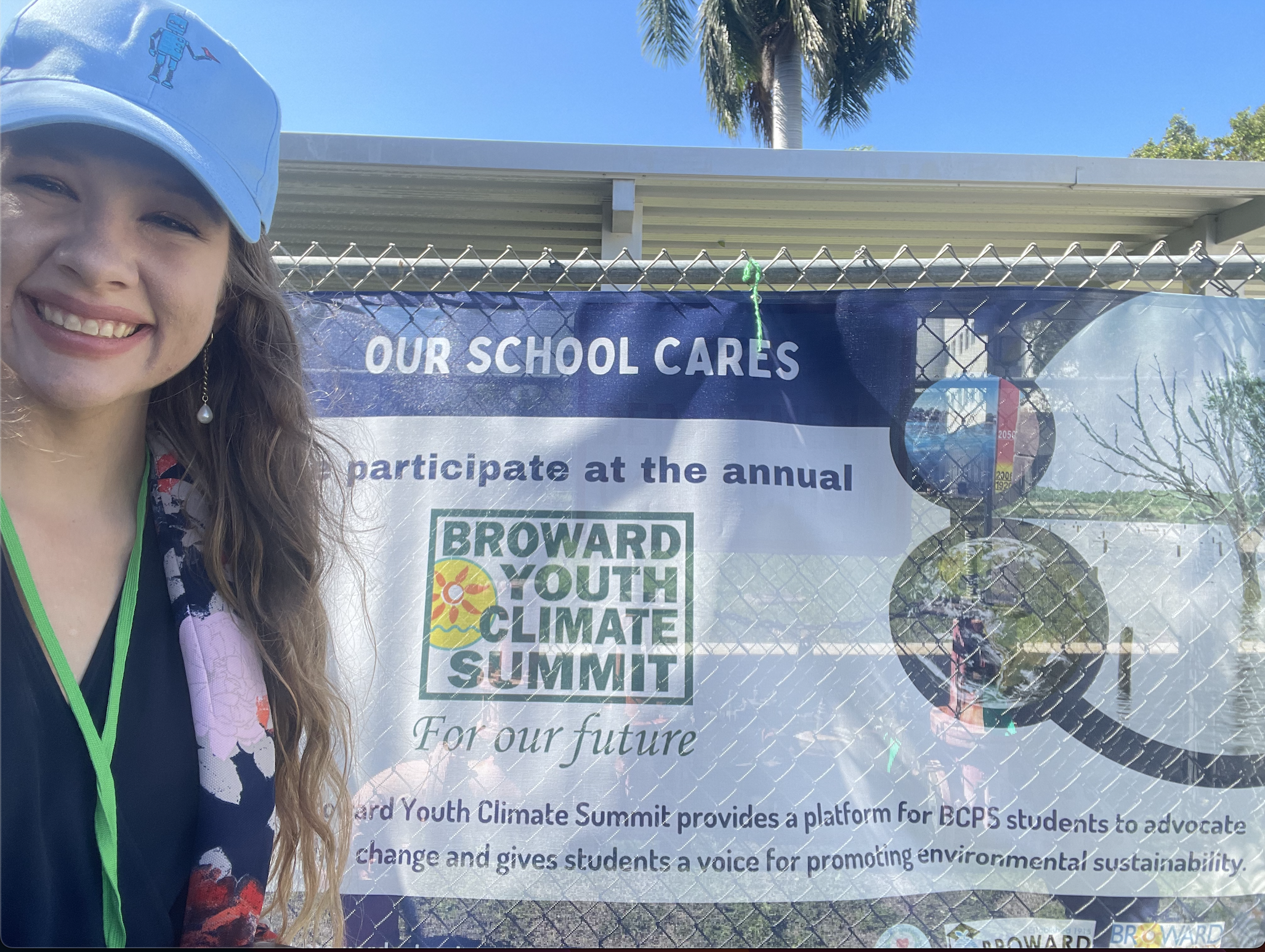 Caroline from SciStarter with Climate Summit Sign