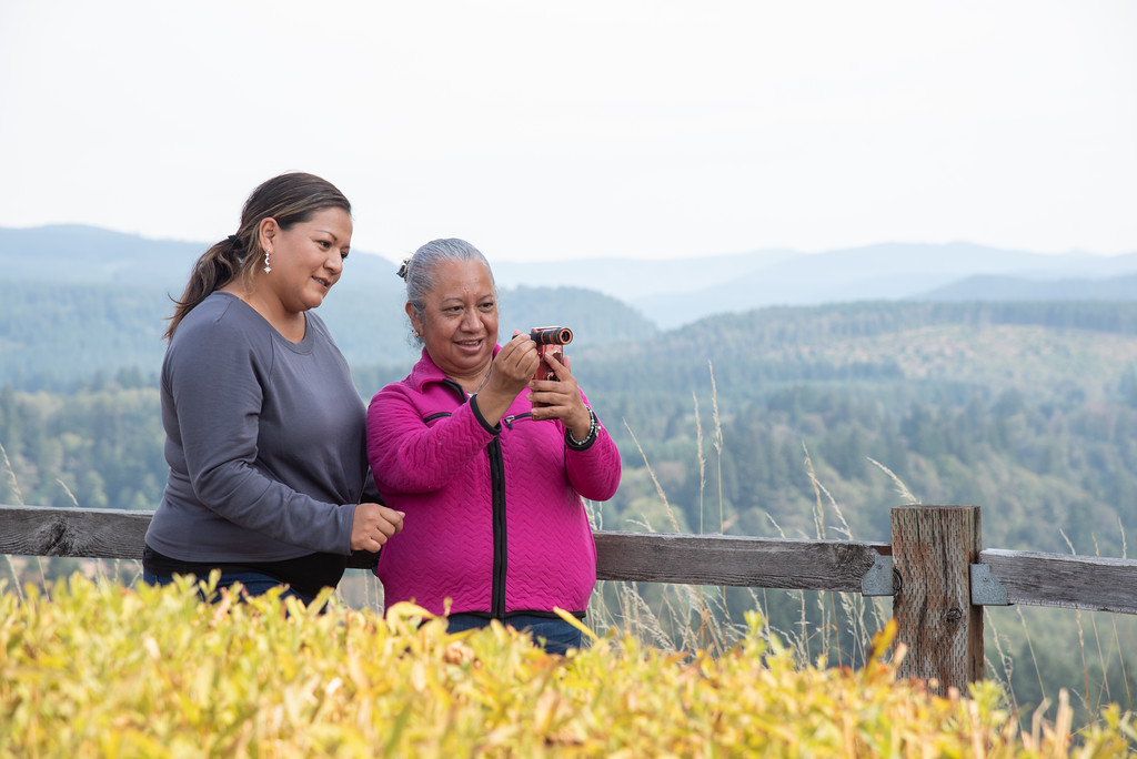 Two women doing citizen science outside during Citizen Science Month.
