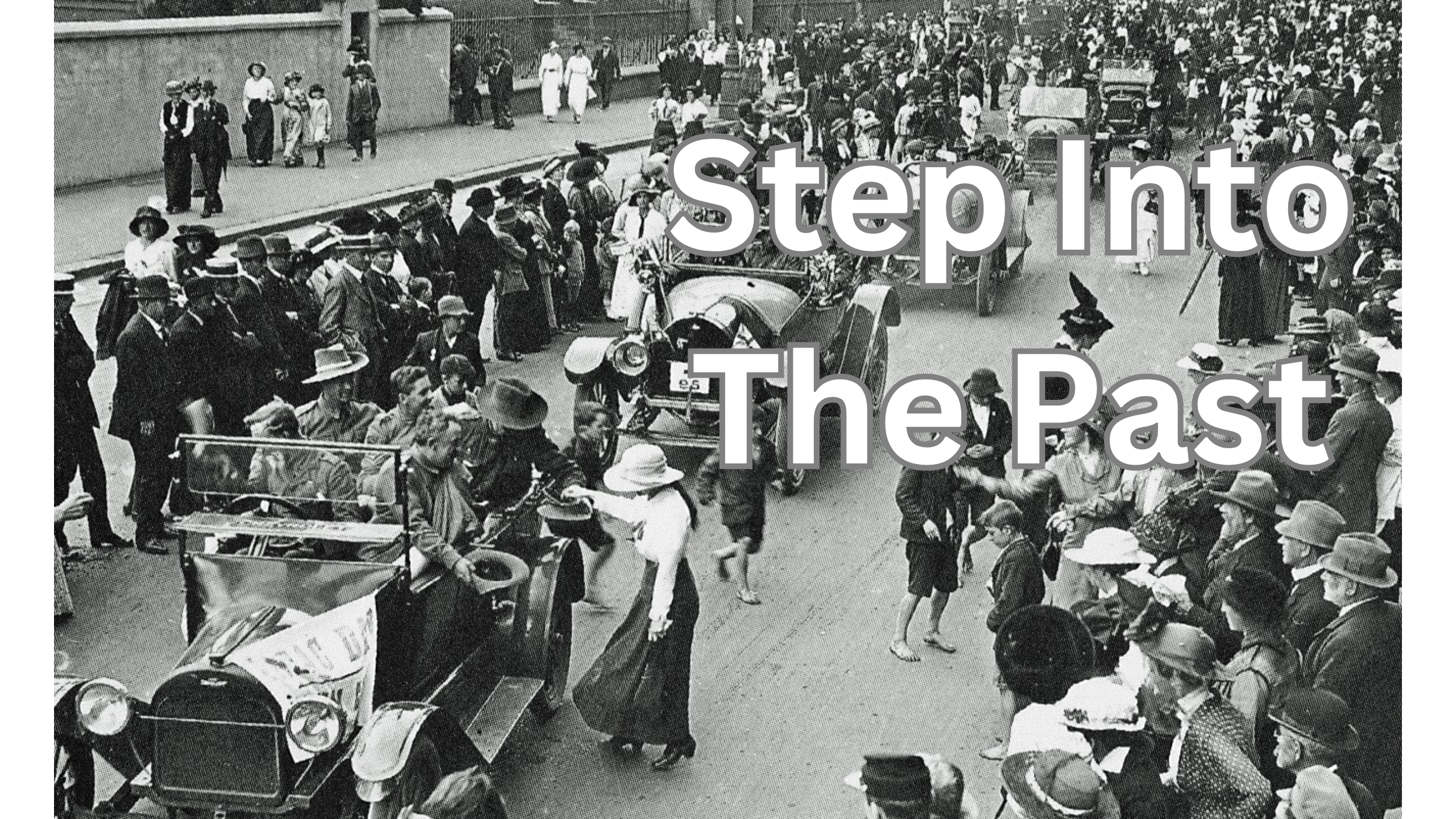 Photo of parade in New Zealand from 1916, with cars from the period and onlookers.